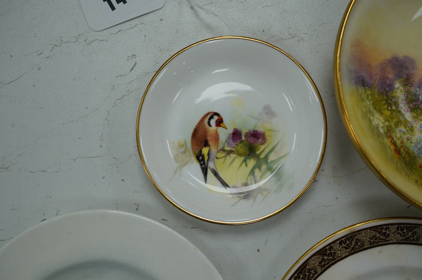 Five Worcester cabinet dishes, each signed, including Jas Stinton, largest 22cm. Condition - fair to good